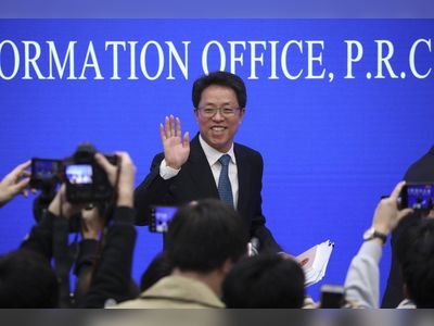 Beijing official handling Hong Kong affairs moved to top political advisory body