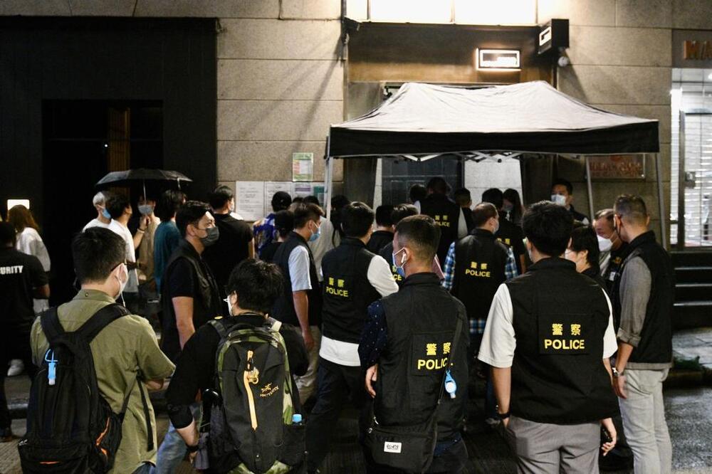 Police cluster adds another infection as HK sees 1,276 Covid cases