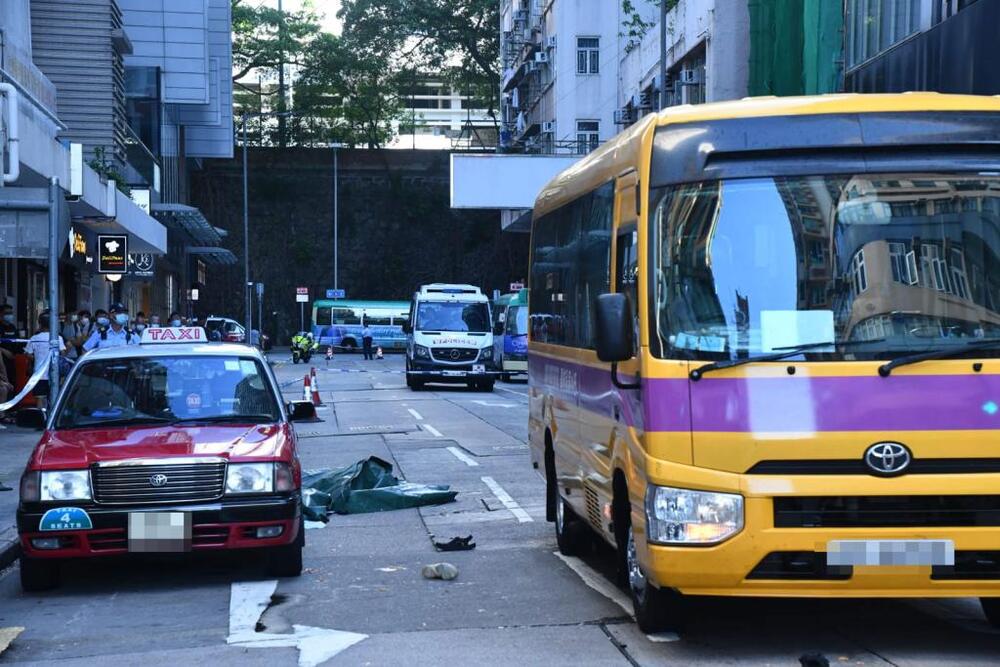 Couple plunges to death in Kennedy Town, lands on taxi and school bus