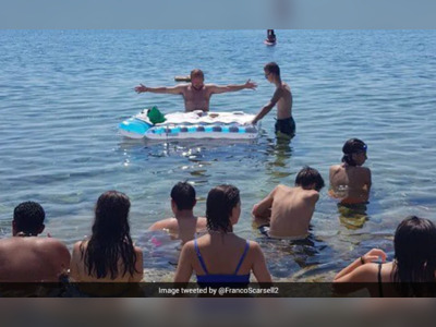 Italian Priest Holds Mass In The Sea With Inflatable Altar, Criticised
