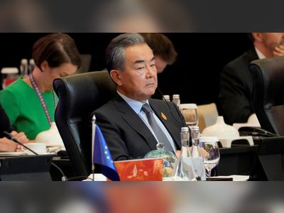 China's Wang Yi tells Australia to act as partner, not opponent