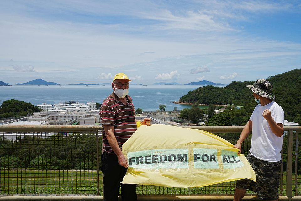 Priest begins protest outside Hong Kong prison against detention of activists