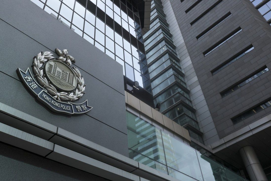 Snoozing Hong Kong police officer faces probe after gun left unattended