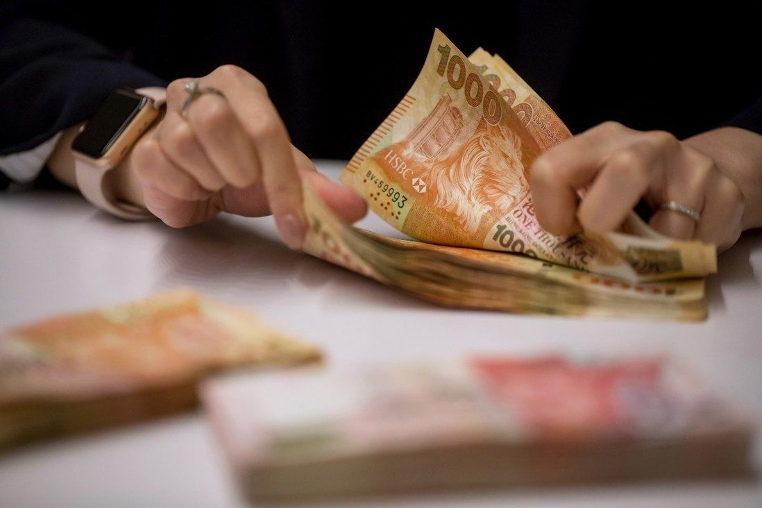 Hong Kong’s monetary base can uphold US dollar peg, finance chief says