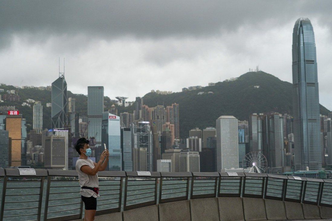 Hong Kong reports 2,227 infections even as bad weather closes testing centres