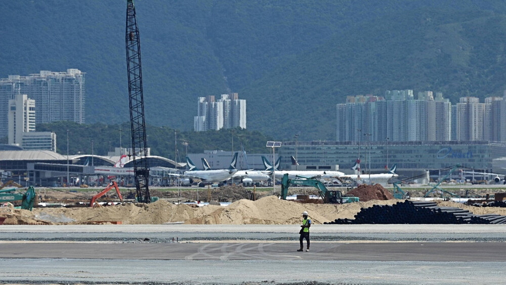 Two charged with bribery over runway project scandal, including Airport Authority top exec
