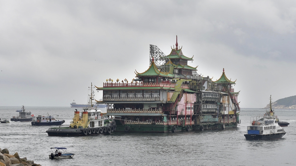 Jumbo’s tugboat sets sail back to home port as iconic restaurant’s fate remains unknown