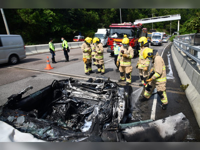Two escape unharmed from burning Ferrari