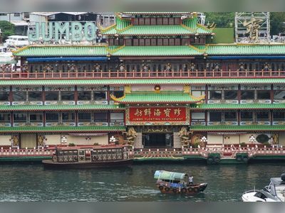 Hong Kong’s Jumbo Floating Restaurant upside down and trapped on a reef