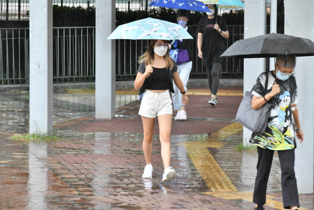 Showers to ring in October, dampening double holidays