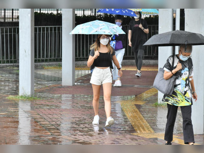 Showers to ring in October, dampening double holidays