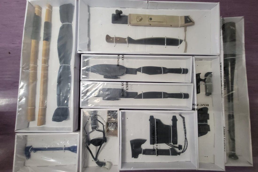Musician charged after Hong Kong police seize explosives and weapons