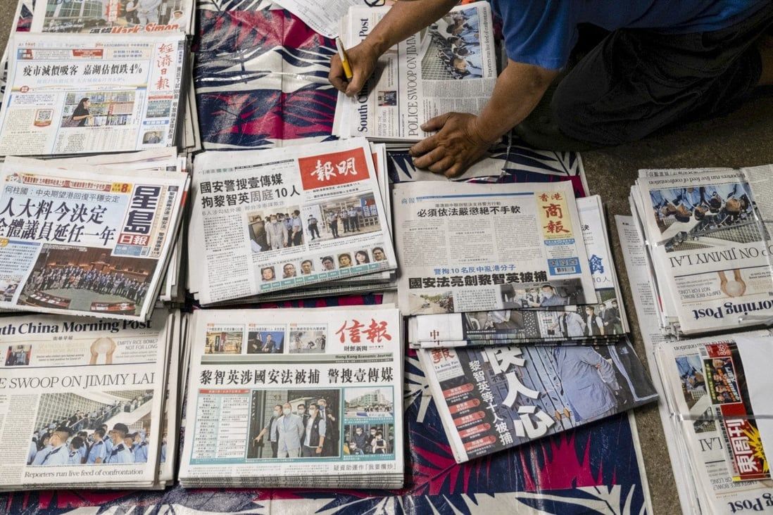 Hong Kong’s leader urges journalists to stay away from ‘camouflaged media’