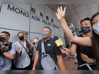 Hong Kong journalists’ group chief charged days before Oxford fellowship trip