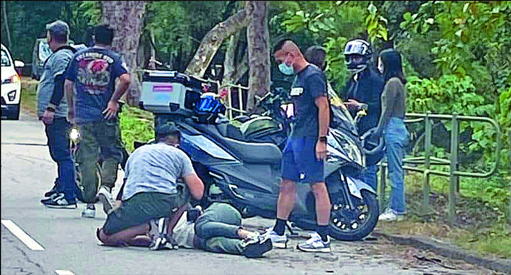 Driver held over death of biker