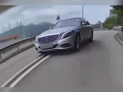 Driver arrested after car filmed travelling on wrong side of Hong Kong highway