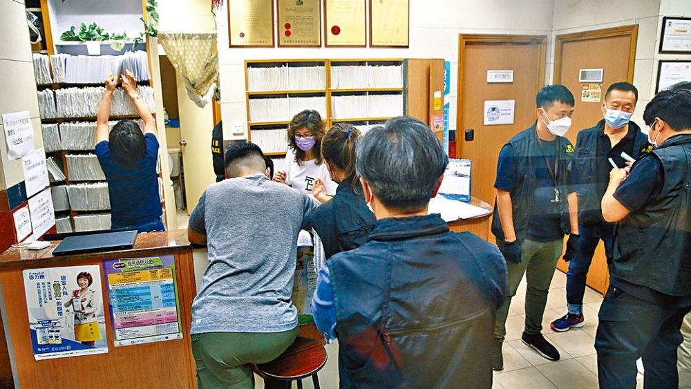 Four civil servants arrested for buying multiple vax exemptions for up to HK$2,500