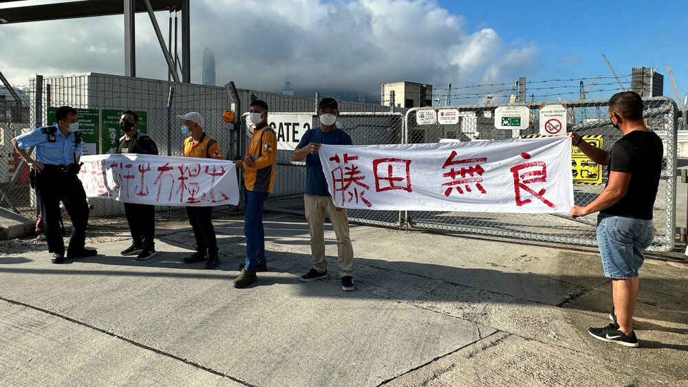 Austin Road construction site workers protest over HK$850,000 in unpaid wages