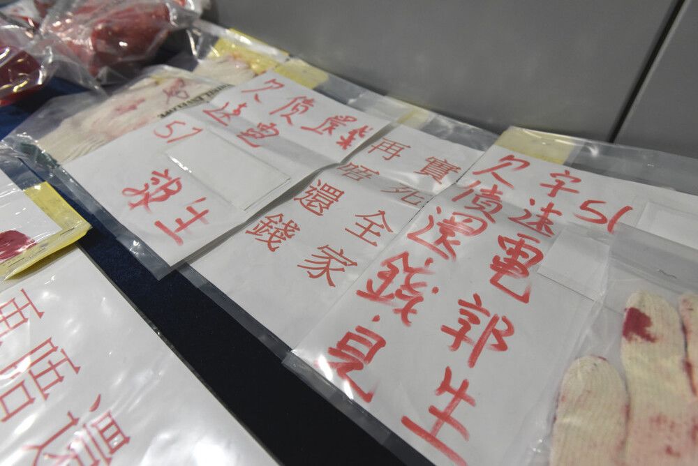 Fourteen arrested over HK$1.5m illegal debt recovery in Wan Chai