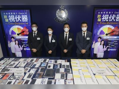 Police arrest 56 for scamming HK$7 million out of Hong Kong and Macau residents