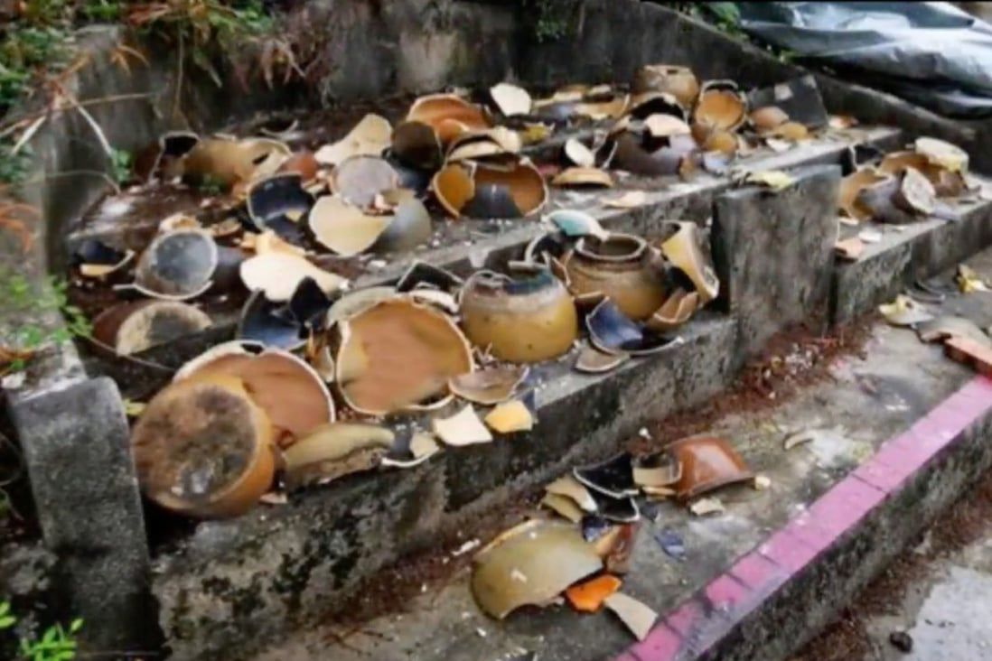 Hong Kong police step up patrols at graveyards after 160 urns smashed