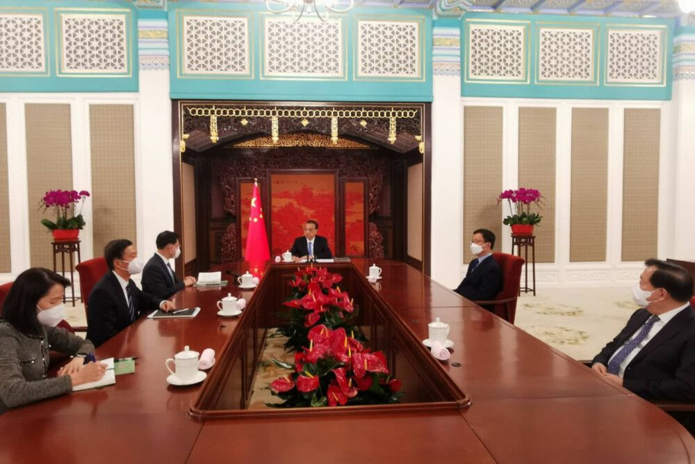 Beijing acclaims John Lee's half-year job