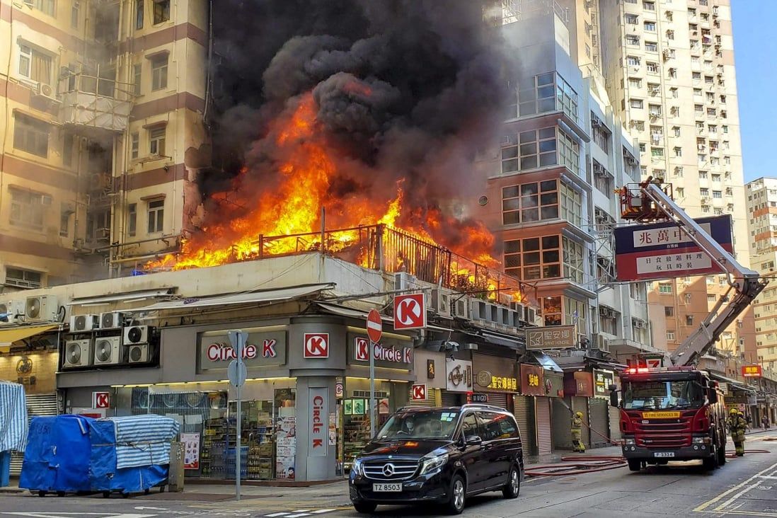 92 people evacuated after fire breaks out at Hong Kong residential building podium