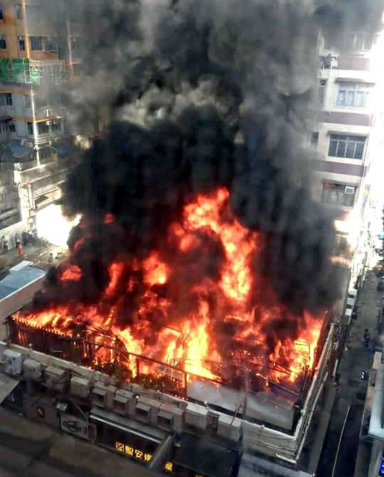 Man sent to hospital, about 100 evacuated in fire at Mong Kok building’s podium