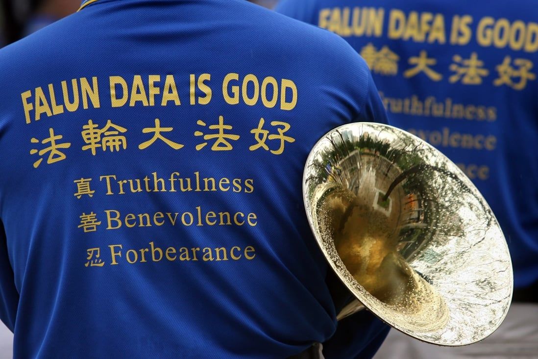 Hong Kong vigilante given suspended sentence for damaging Falun Gong property