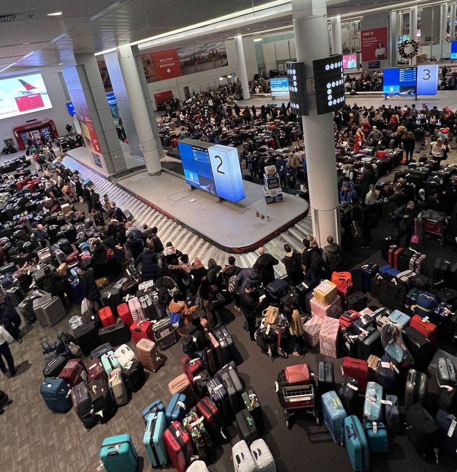 Pearson Airport in Toronto: A mass of humanity and luggage upon arrival.