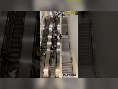 Man fined HK$3,000 after sliding next to escalator in MTR station