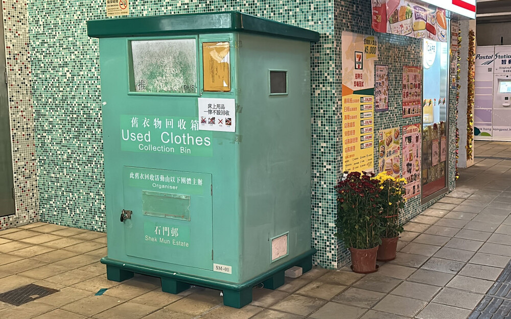 Man arrested after stealing clothes from recycling box and fleeing