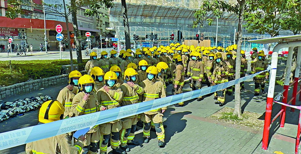 Rabbits rescued as 100 trainee firefighters comb inferno debris