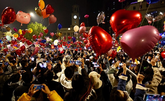 Thousands Gather To Celebrate New Year In China Amid Covid Surge