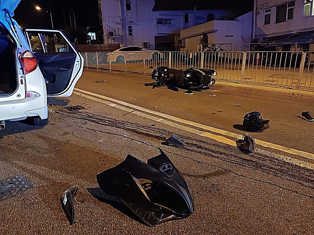 Biker hospitalized after crashing into sedan in Sai Kung