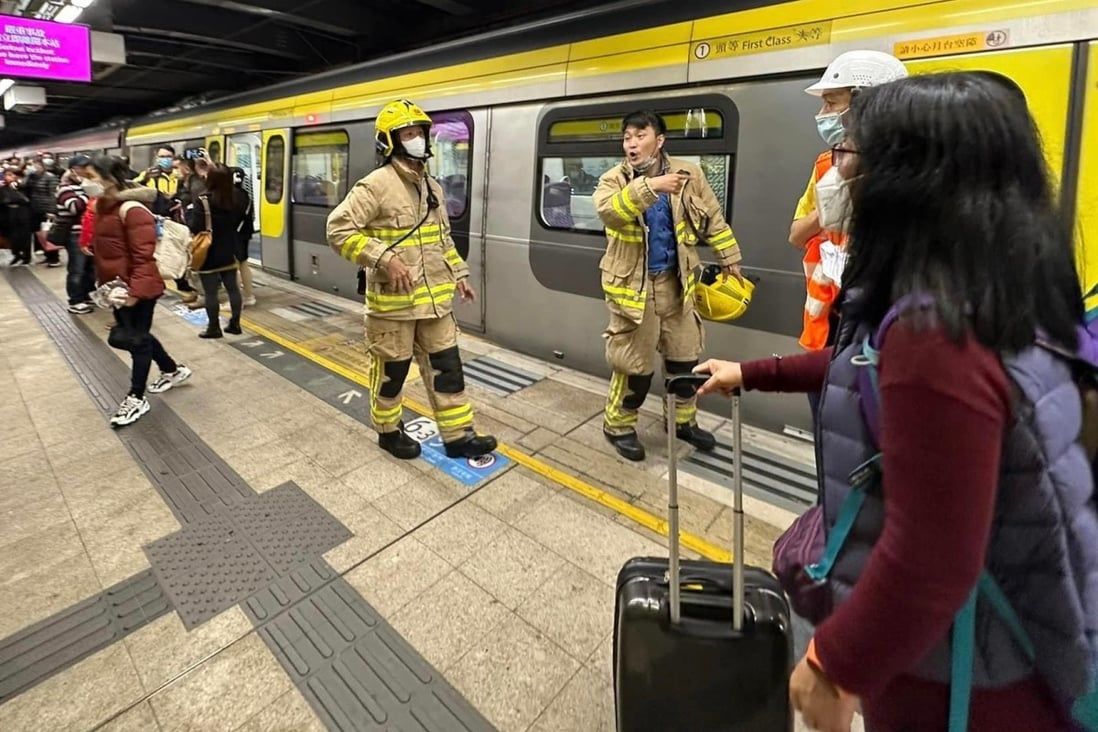 Hong Kong train makes emergency stop after elderly man falls onto tracks