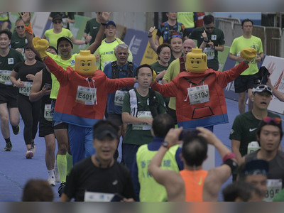 35,000 runners feature in Hong Kong Marathon despite drizzly morning