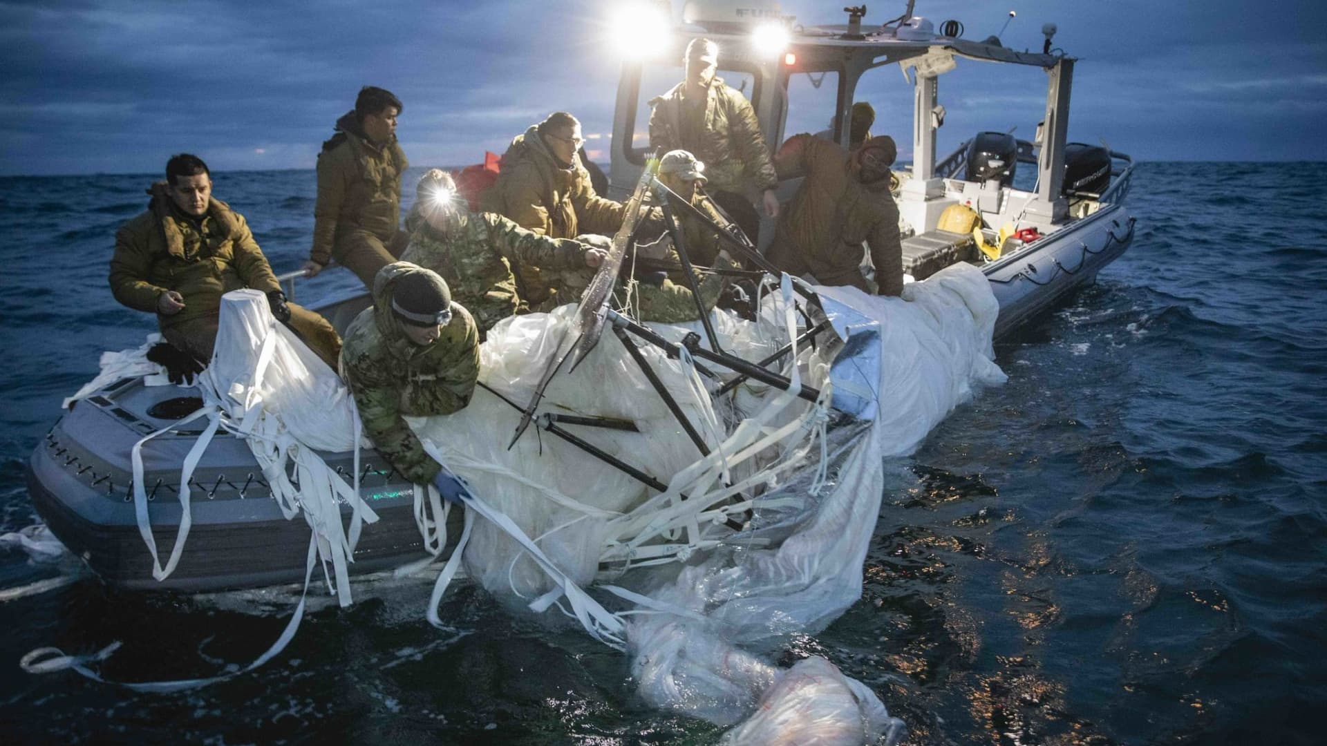New photos show the Navy recovering downed China spy balloon off U.S. coast