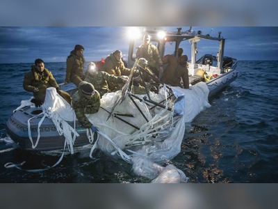 New photos show the Navy recovering downed China spy balloon off U.S. coast