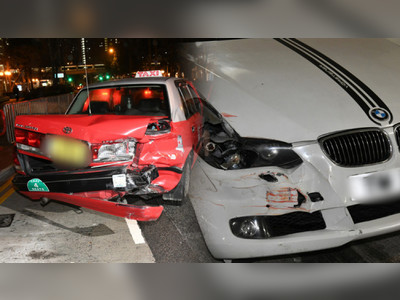 Man turns himself in after crashing BMW into three taxis in Kwun Tong
