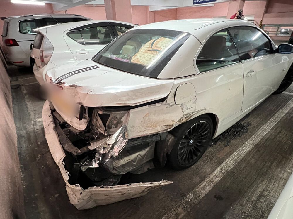 Man turns himself in after crashing BMW into three taxis in Kwun Tong