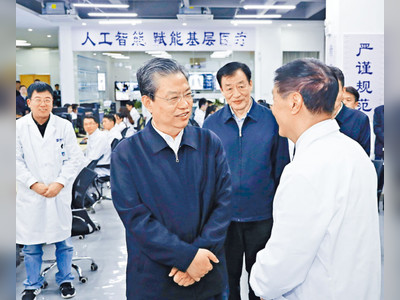 Hong Kong NPC deputies greeted by presidium chairman Zhao Leji
