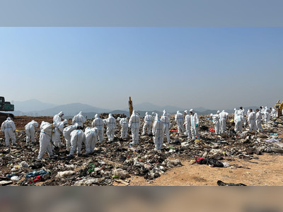 Slain model's landfill search continues