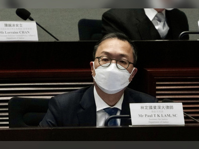Justice chief Paul Lam doffs his cap to Hong Kong’s lady lawyers on International Women’s Day