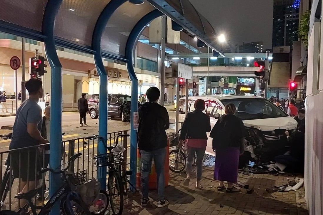 Hong Kong pedestrian pinned against wall as car mounts pavement after crash