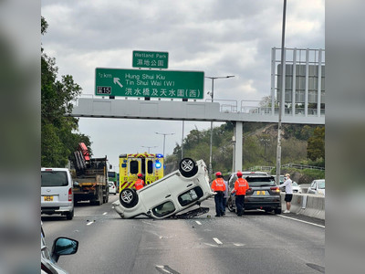 Two drivers injured as car overturns on Yuen Long Highway