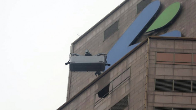 Two workers trapped in cleaning gondola at Standard Chartered Bank Building rescued
