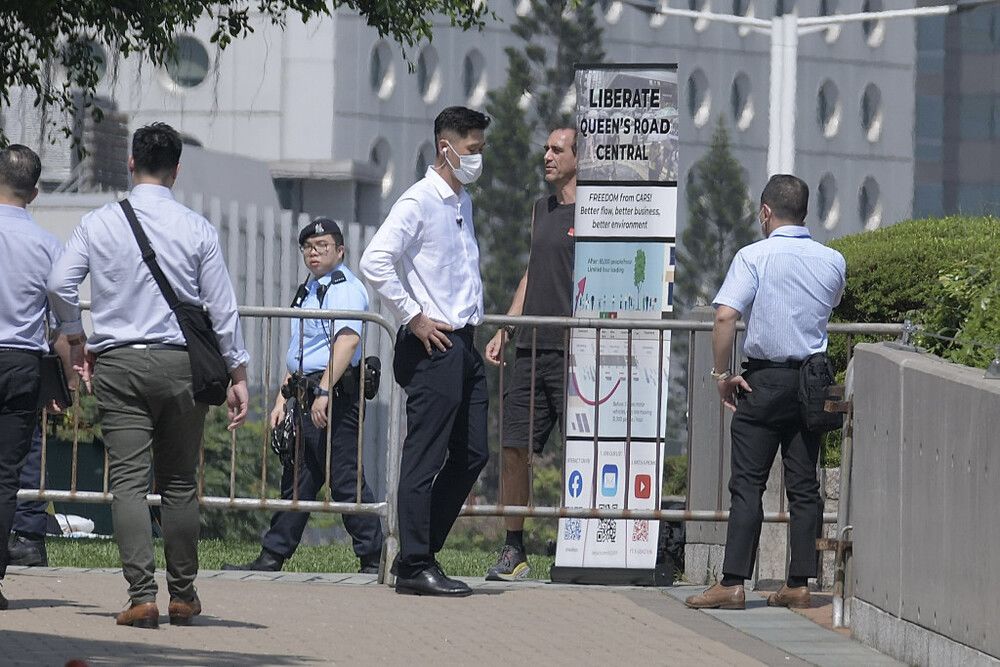 Foreigner taken away over one-man protest outside LegCo complex