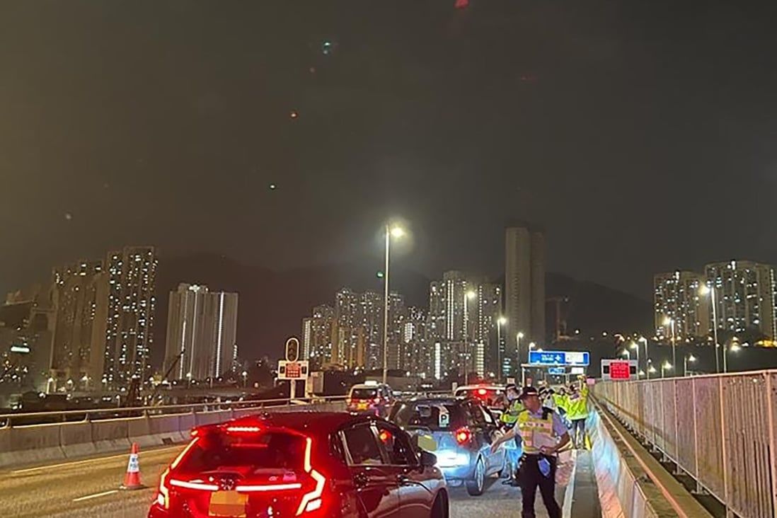Driver arrested after Hong Kong police chase following crash at roadblock