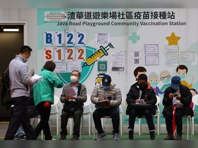 Who is eligible for a free Covid booster under Hong Kong’s revised vaccine rules?